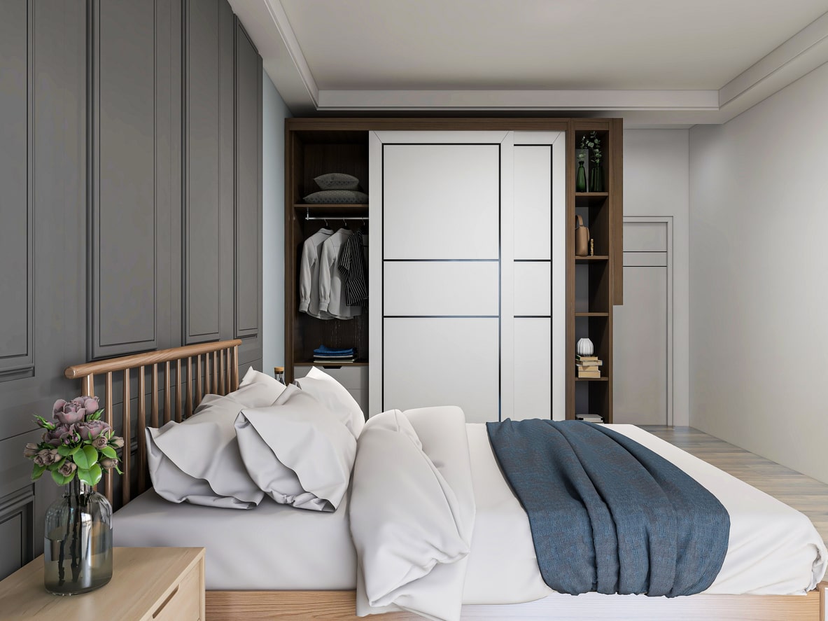 stylish fitted bedroom with smart features in wardrobe